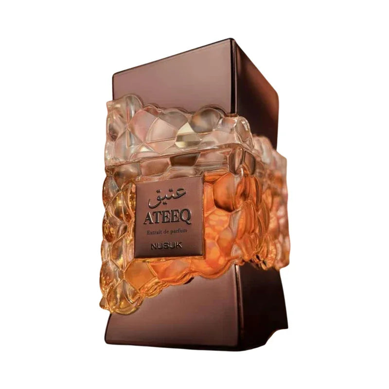 Parfum extrait de parfum Ateeq Nulsiik dans un flacon luxueux aux reliefs ambrés