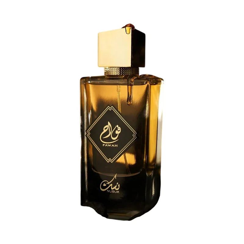 Flacon de parfum Fawah Nusuk aux reflets ambrés avec bouchon doré