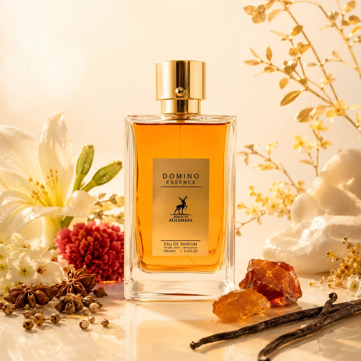 ARVOLA_SHOWCASE — Domino Essence Maison Alhambra, photo artistique fond clair (fleurs exotiques, épices, œillet, muguet, musc, ambre, vanille)