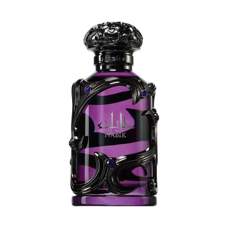Flacon de parfum Mabik violet et noir avec décorations sculptées ornementales
