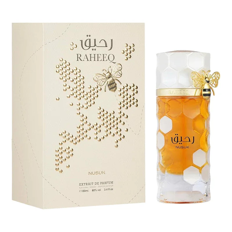 Parfum extrait de parfum Raheeq de Nusuk avec flacon hexagonal et motif abeille dorée.