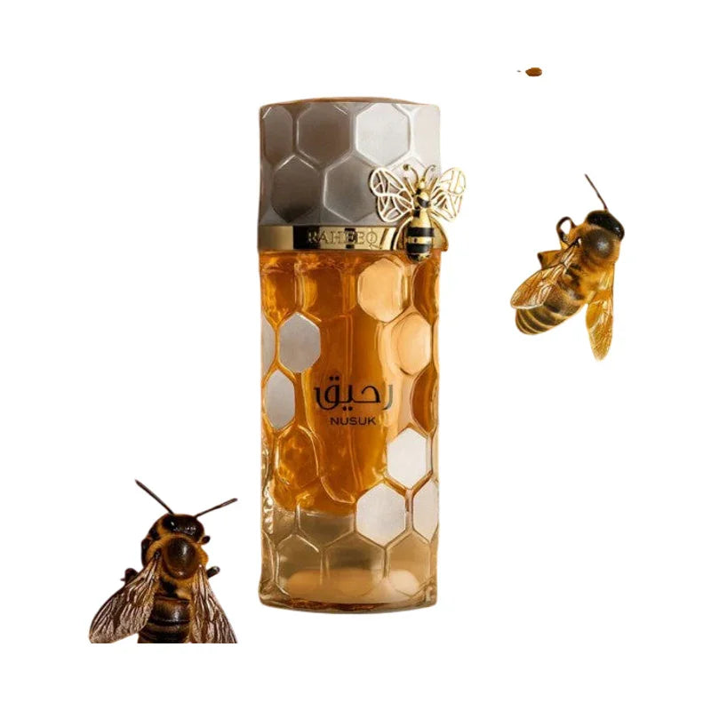 Flacon de parfum Nusuk au design alvéolé doré entouré d'abeilles