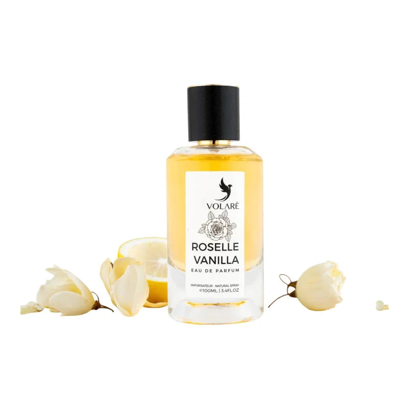 Parfum Eau de Parfum Roselle Vanilla Volaré avec fleurs blanches et citron sur fond blanc