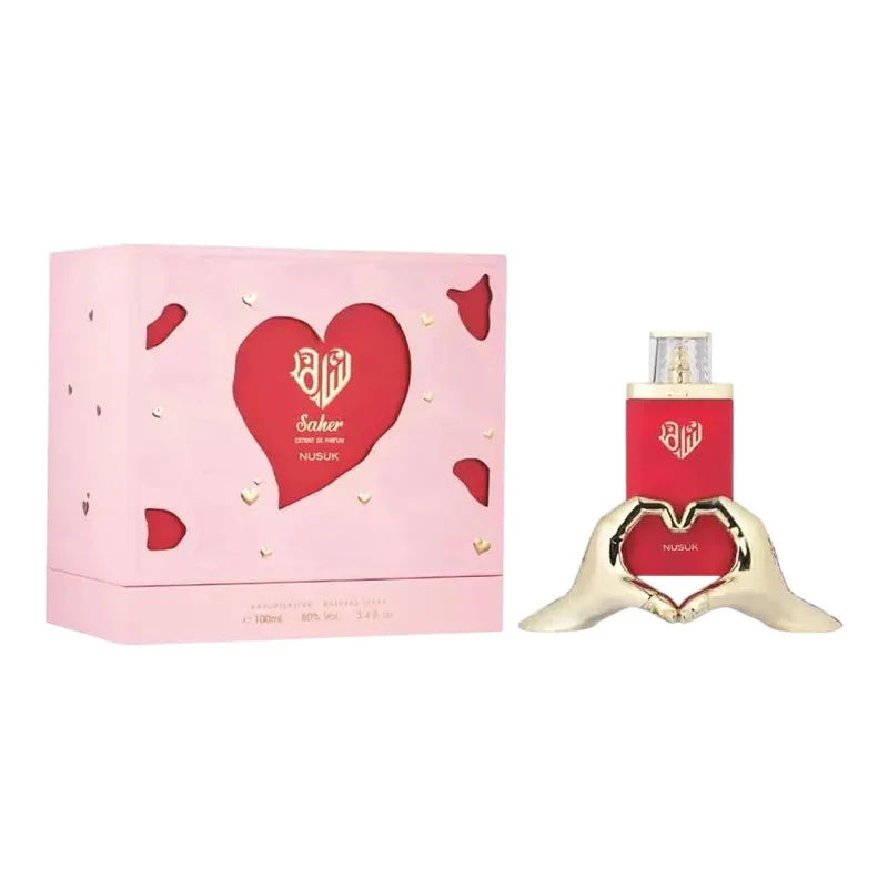 Parfum Nusuk pour femme dans son coffret rose et flacon rouge au design cœur doré.