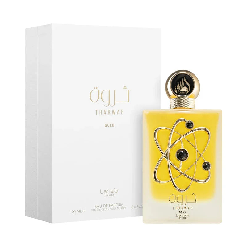 Parfum Tharwah Gold de Lattafa Pride, flacon jaune et boîte blanche élégante.
