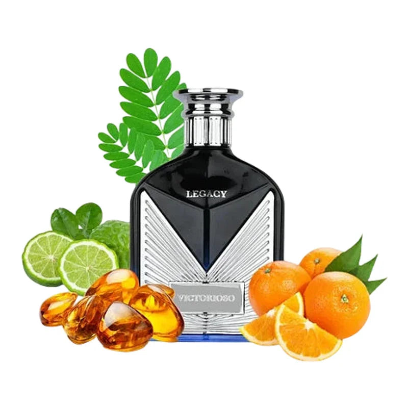Parfum Legacy Victorioso pour homme entouré de citrons verts, d'oranges et de feuilles vertes