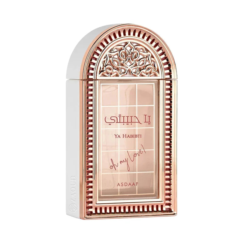 Parfum Ya Habibti d'Asdaaf dans un flacon élégant rose doré ornementé.