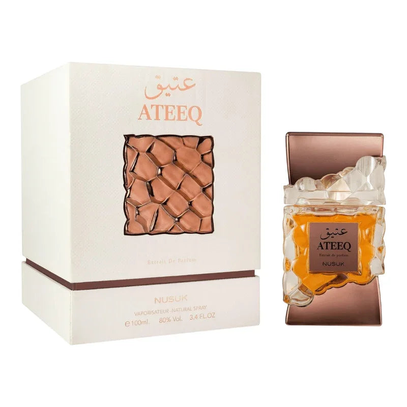 Parfum Ateeq Nusuk extrait de parfum pour homme dans son flacon ambré et son coffret blanc.
