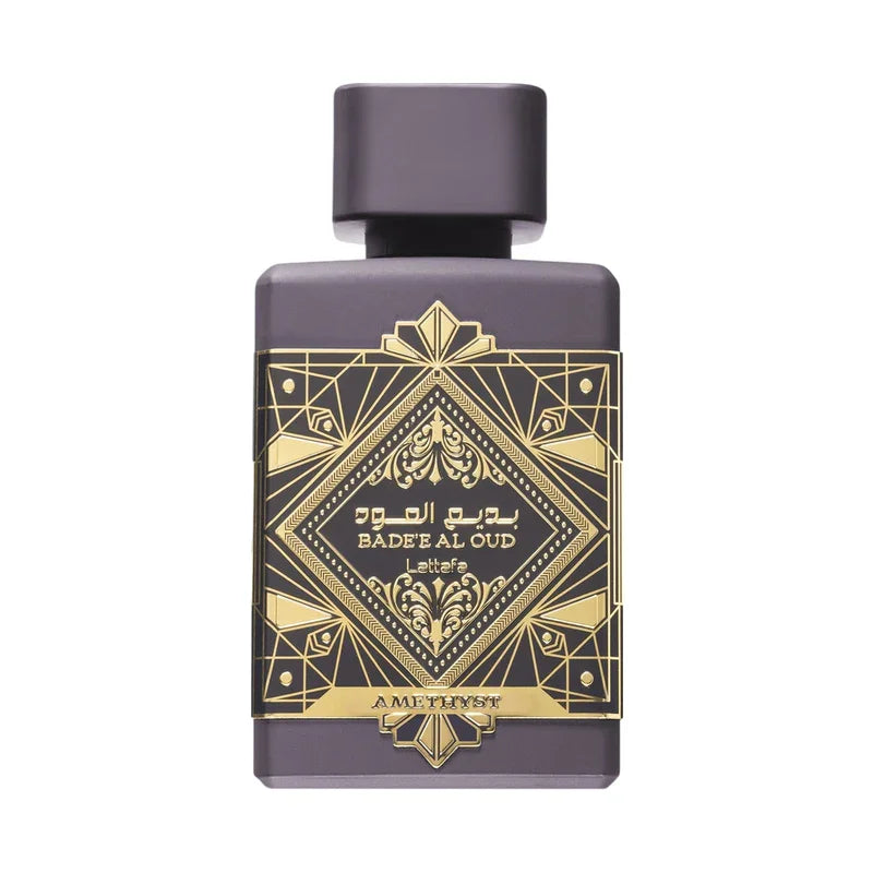 Flacon de parfum Badee Al Oud Amethyst, design doré élégant, senteur orientale luxueuse