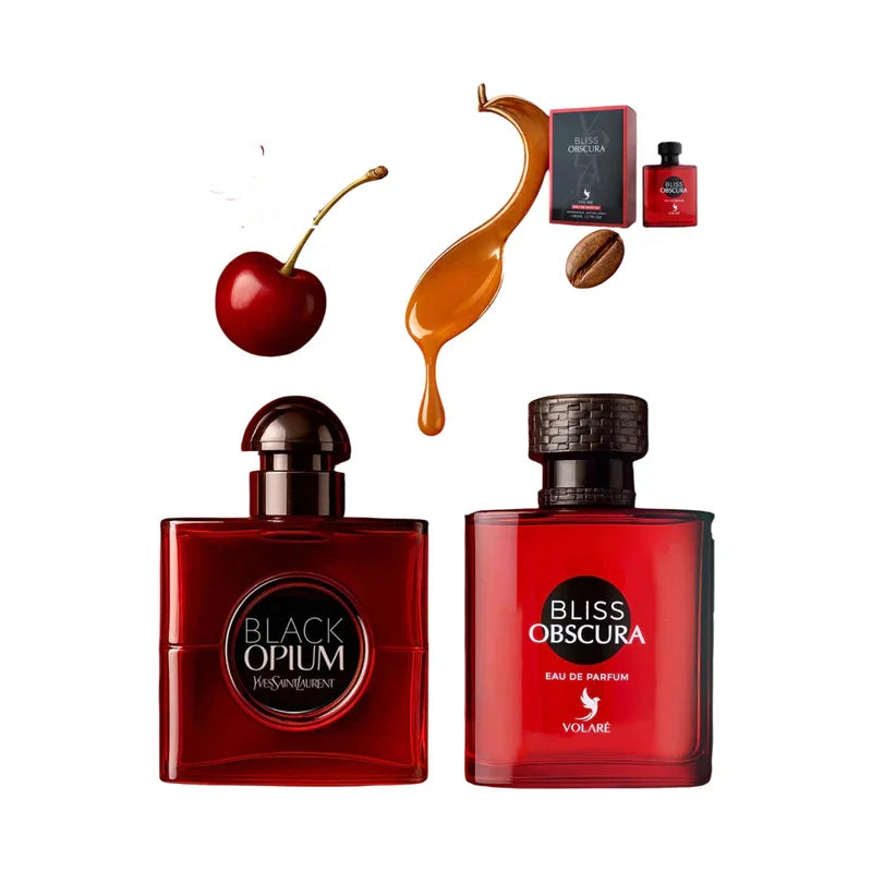 Parfum Black Opium et Bliss Obscura avec cerise, café et goutte de miel sur fond blanc.