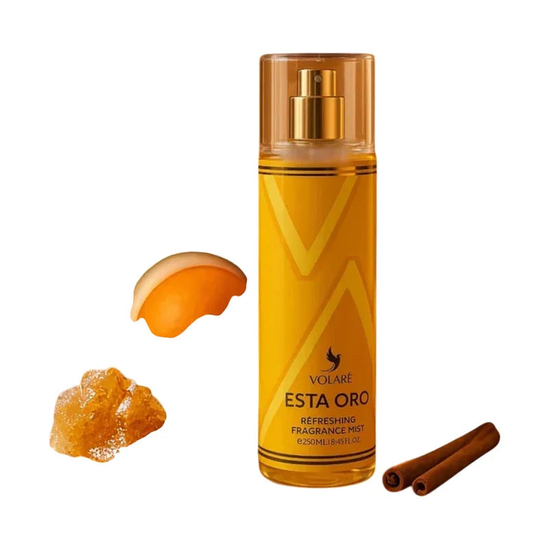 Brume parfumée Esta Oro avec morceaux d'ambre, tranche d'agrume et bâtons de cannelle.