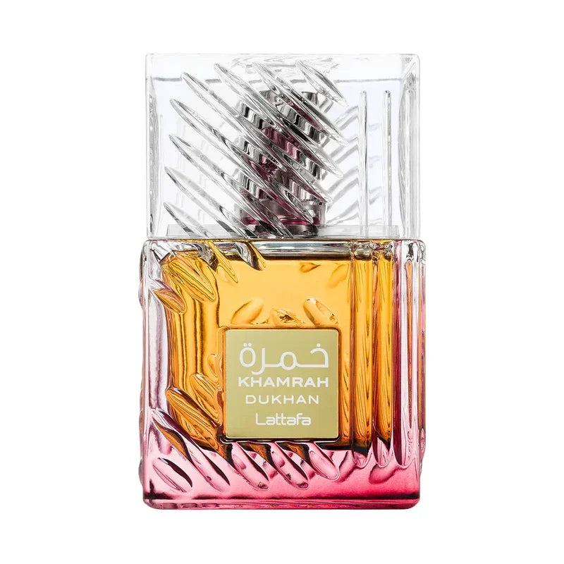 Parfum Khamrah Dukhan Lattafa, flacon design éclatant avec dégradé doré-rose et capuchon texturé