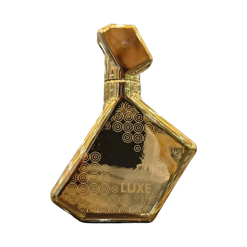 Flacon de parfum doré luxueux avec motifs géométriques et bouchon sculpté