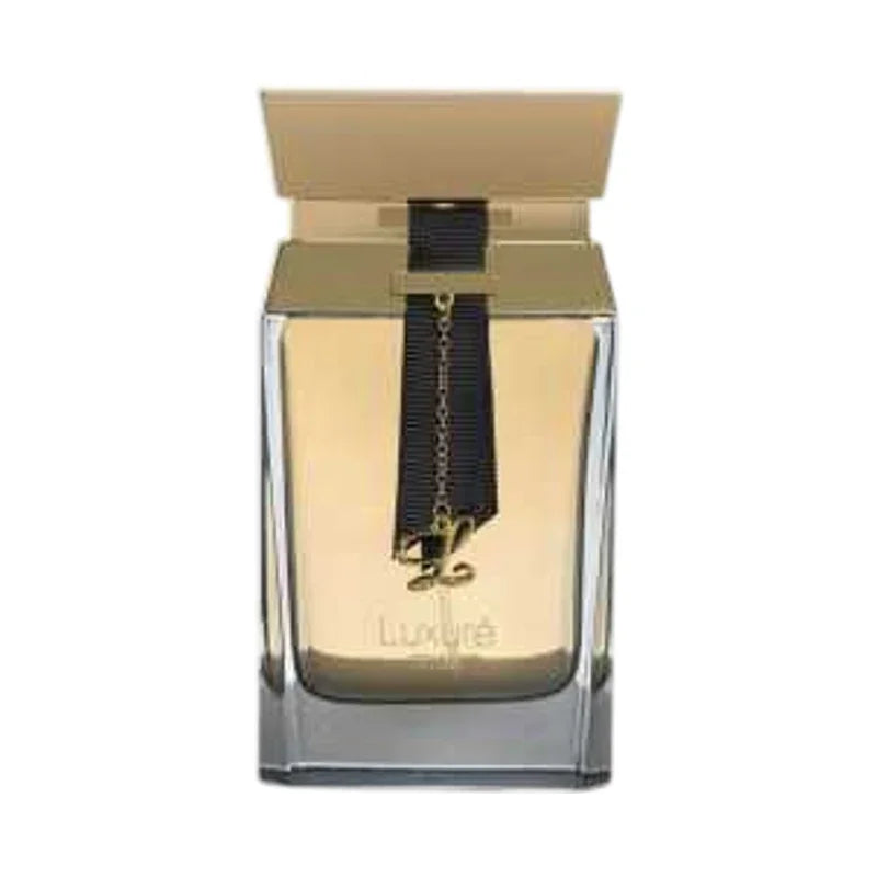 Flacon de parfum Luxuré avec bouchon doré et ruban noir décoratif