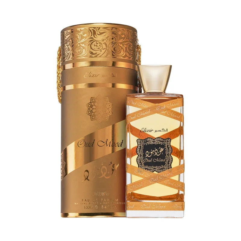Parfum Oud Mood Elixir dans son flacon en verre et son coffret doré luxueux.