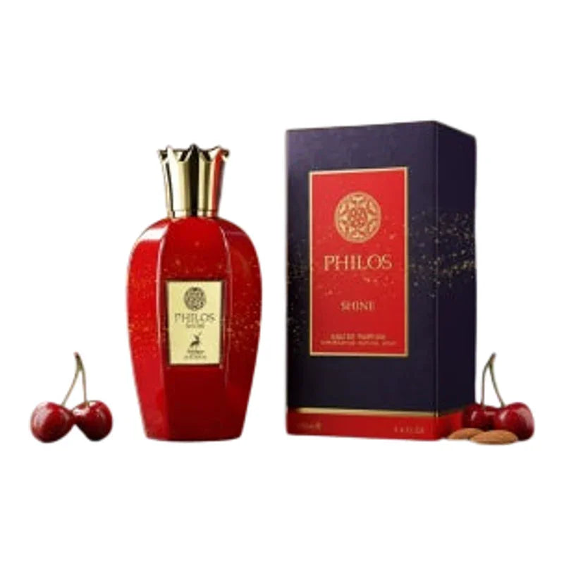 Parfum Philos Shine en flacon rouge scintillant avec écrin luxueux et cerises fraîches
