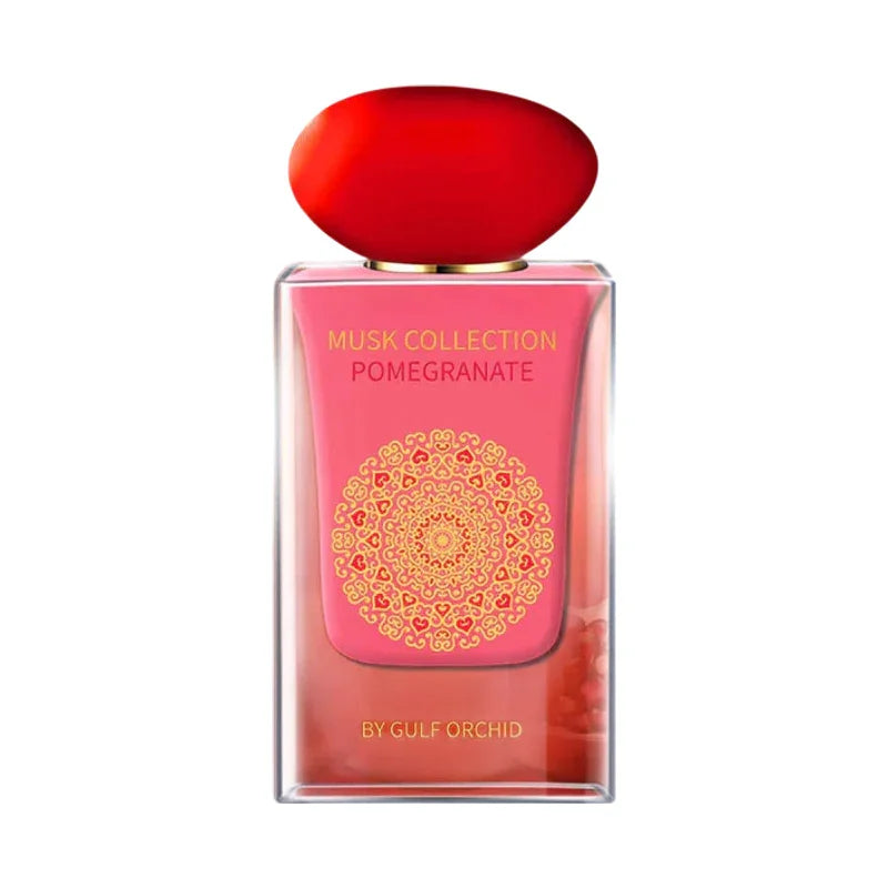 Parfum Pomegranate de la collection Musk, flacon rose avec motif doré et bouchon rouge