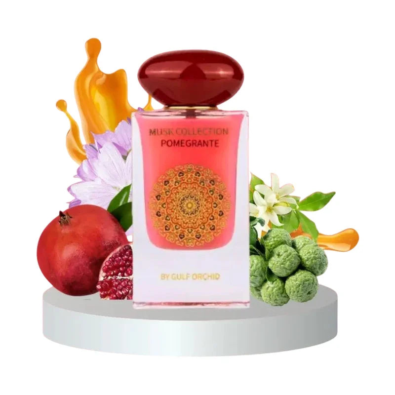 Parfum Pomegranate de la collection Musk, flacon rose avec grenade et fleurs, parfum d'ambiance élégant