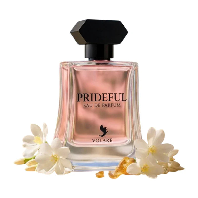 Parfum Eau de Parfum Prideful Volare dans un flacon rose avec fleurs de jasmin blanches.