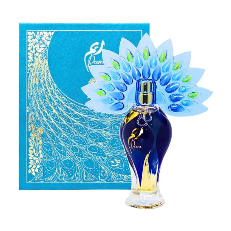 Parfum Reem en flacon bleu avec éventail de paon, coffret cadeau élégant