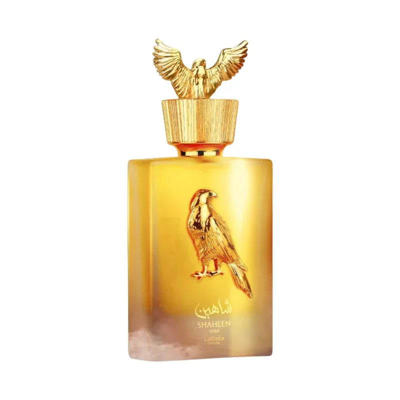 Parfum Shaheen Gold de Lattafa dans un flacon doré orné d'un faucon majestueux.