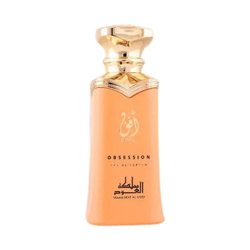 Flacon de parfum Obsession de Mamlakat Al Oud, extrait de parfum ambré avec bouchon doré.