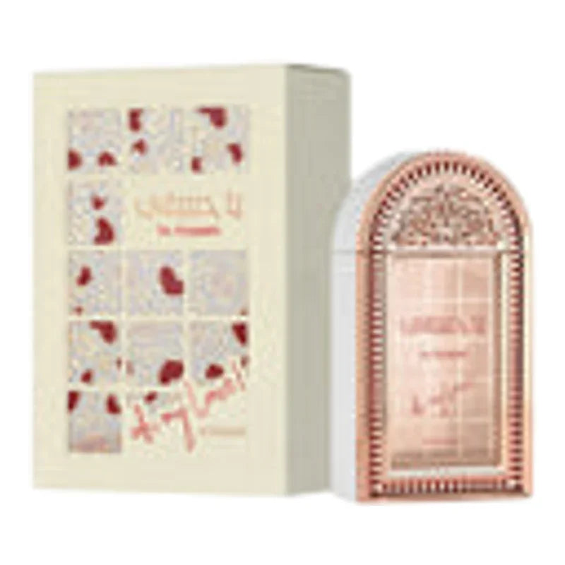 Coffret de parfum élégant avec flacon décoratif rose et boîte illustrée de motifs rouges.