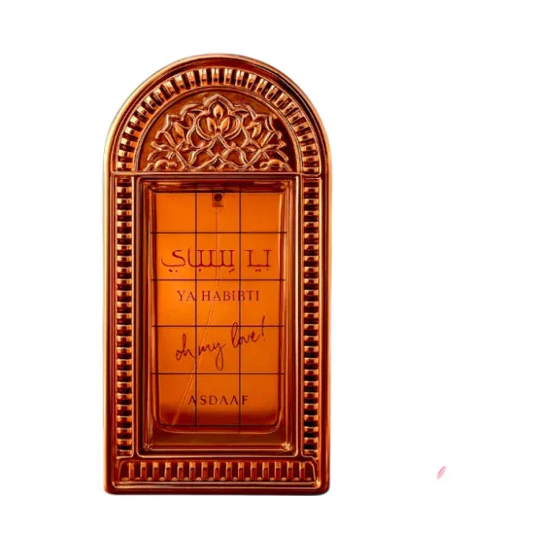 Parfum Ya Habibti de Asdaaf dans un flacon ambré au design ornemental élégant.